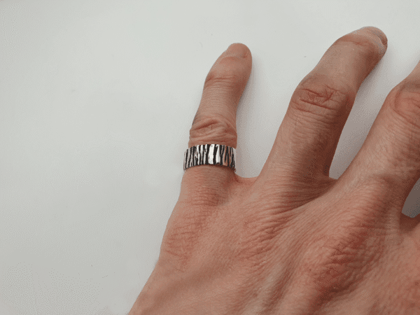 Shard Ring. Angular Sterling Silver with Oxidised Shadows Sterling silver ring with fractured, angular texture and oxidised shadows
