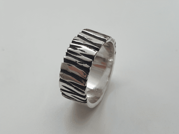 Shard Ring. Oxidised and Polished Silver Symbolising Strength in Fracture oxidised and polished silver ring symbolising strength in fracture