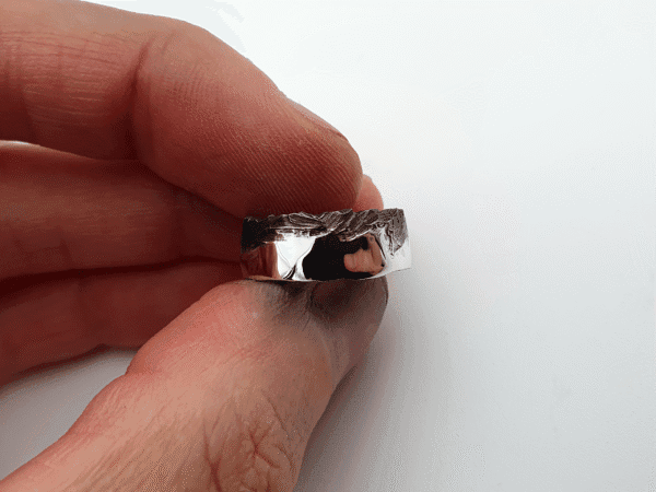 ascent-held-2-alt Ascent ring – textured oxidised ridge emerging through shine