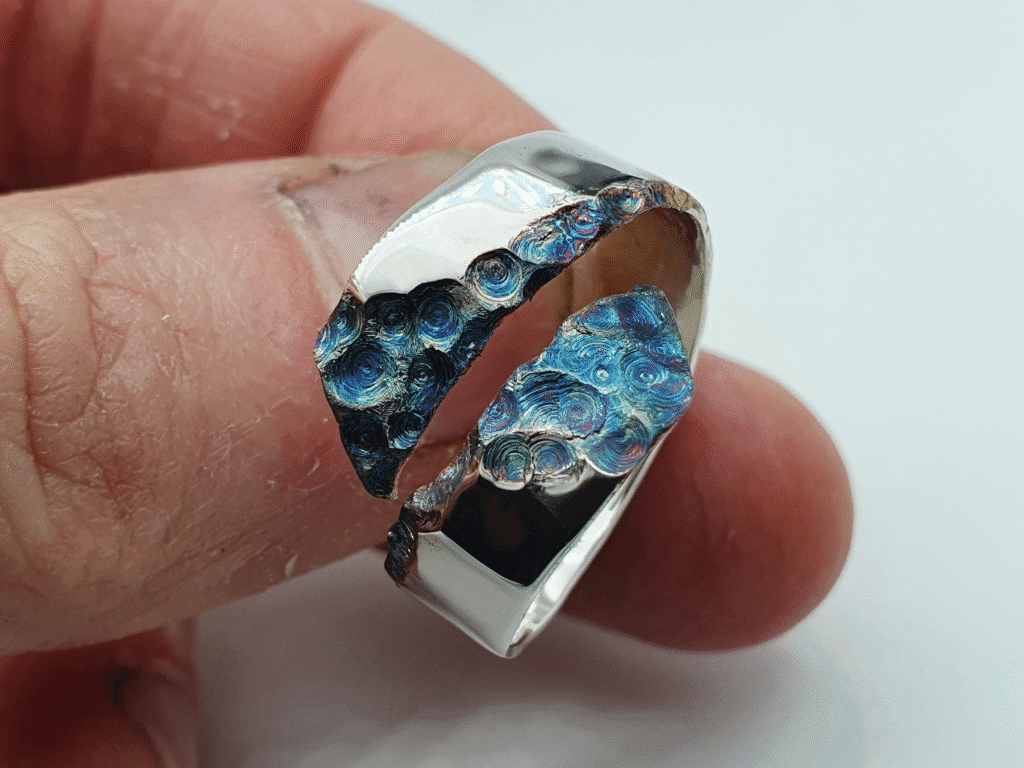 Celestia ring inspired by Starry Night – close-up of carved swirls