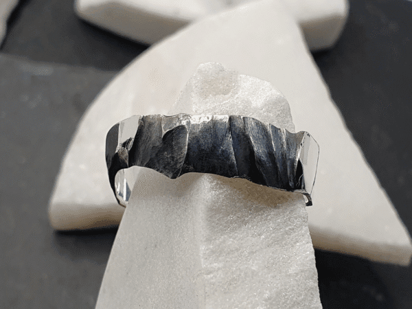 Maelstrom Ring. Front View Showing WaveShaped Oxidised Texture sterling silver ring with wave-shaped oxidised texture – front view