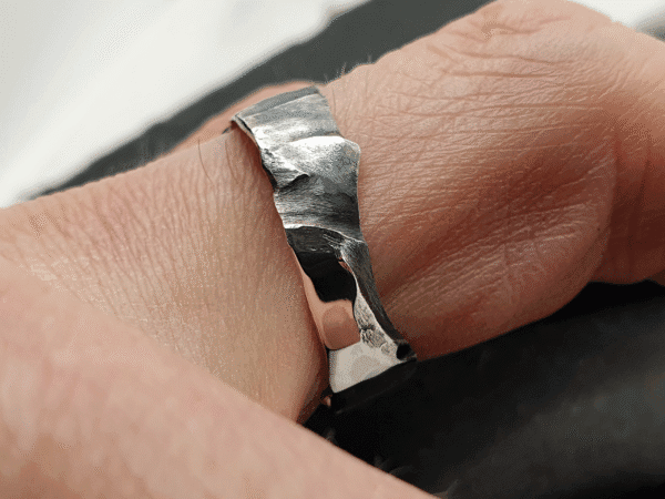 Maelstrom Ring – Silver with Erosion-Inspired Texture and Contrasting Finish Maelstrom Ring – contrast-finished silver ring with natural erosion-inspired pattern