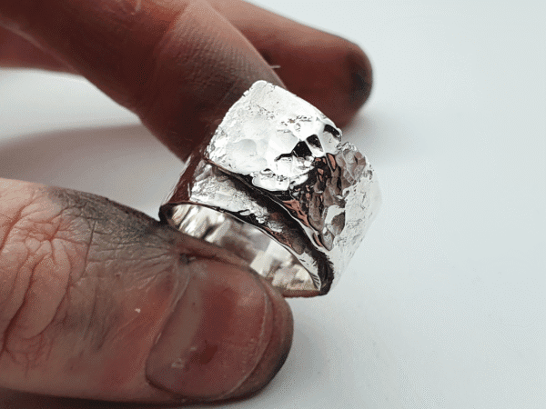 eon-20231221_175455 sculpted silver wrap ring symbolising return and connection
