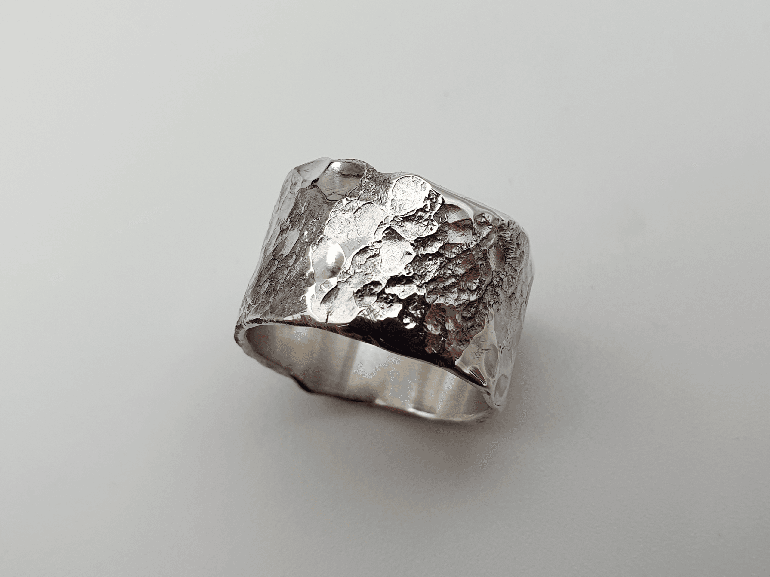Eon Tether Ring, Wide Statement Design with Raw Texture and Mirror Like Silver Sheen Eon Tether Ring, wide statement design with raw texture and mirror like silver sheen