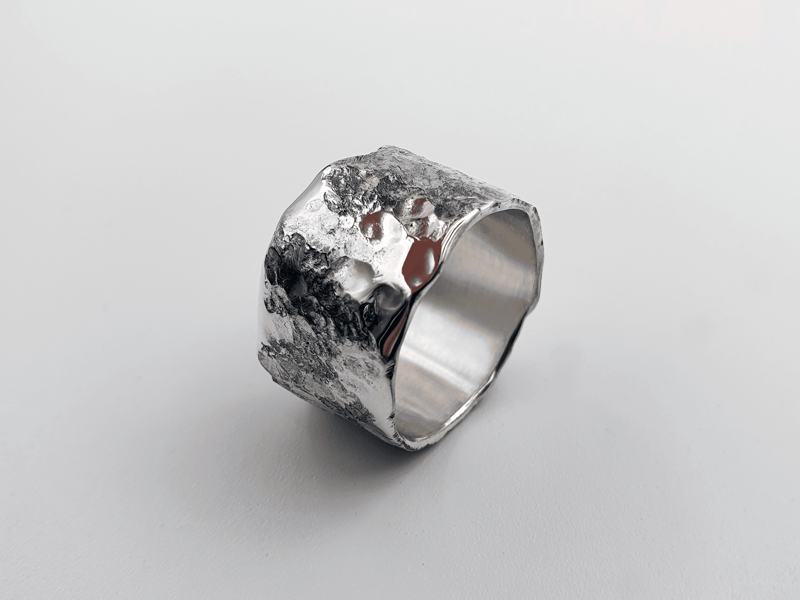 Eon Tether Ring, Organic Cratered Silver Band with Softened Edges and High Polish Eon Tether Ring, organic cratered silver band with softened edges and high polish