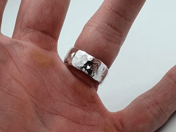 Eon Echo Ring in Sterling Silver with Flowing Design Symbolising Friendship and Time Eon Echo Ring in sterling silver with flowing design symbolising friendship and time