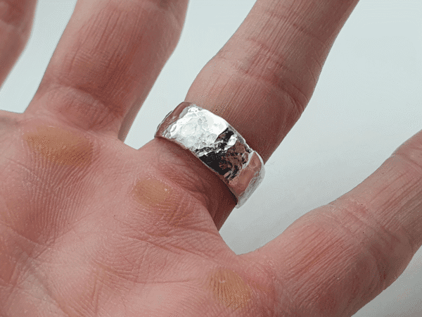 Eon Echo Ring, Handcrafted Silver with Hammered and Polished Crater Surface Eon Echo Ring, handcrafted silver with hammered and polished crater surface