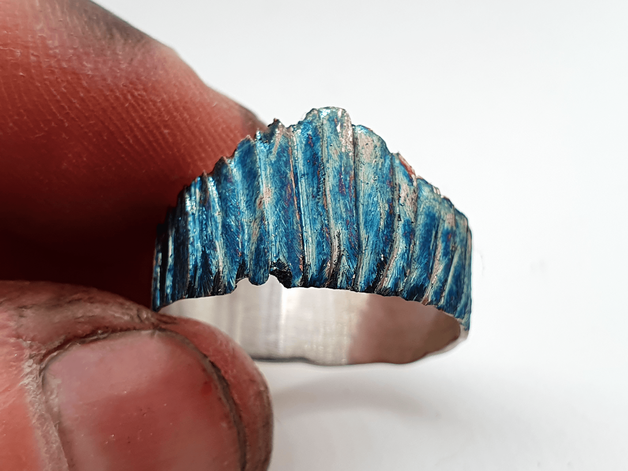 neptunes-crown-1 oxidised silver ring with jagged blue crown texture – Abyss