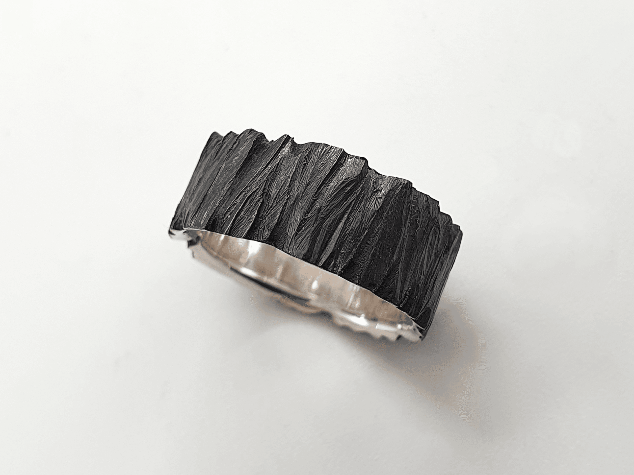 oblivion-4 oxidised silver band with raw surface and dark patina