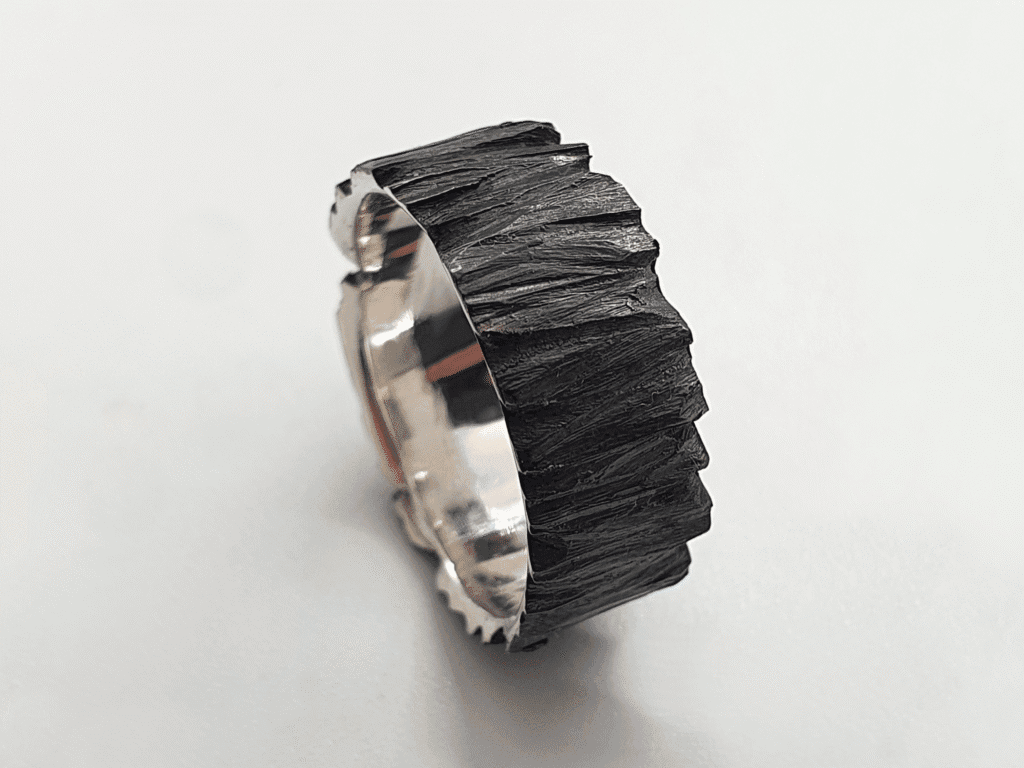 oxidised silver ring with matte black texture – front view