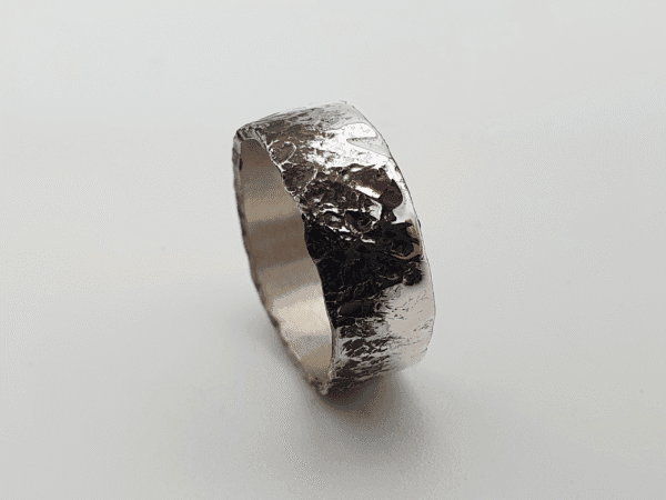 onyxian-1 Handcrafted black and silver ring inspired by volcanic formations